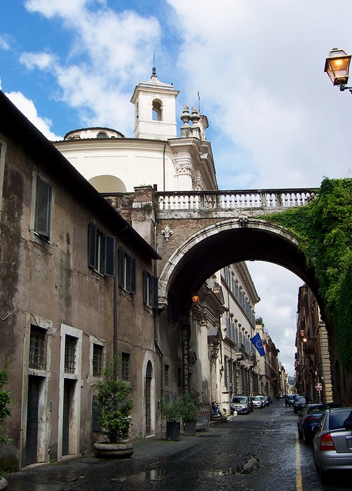 Via Giulia in Rome with historic facades and a quiet street perspective.